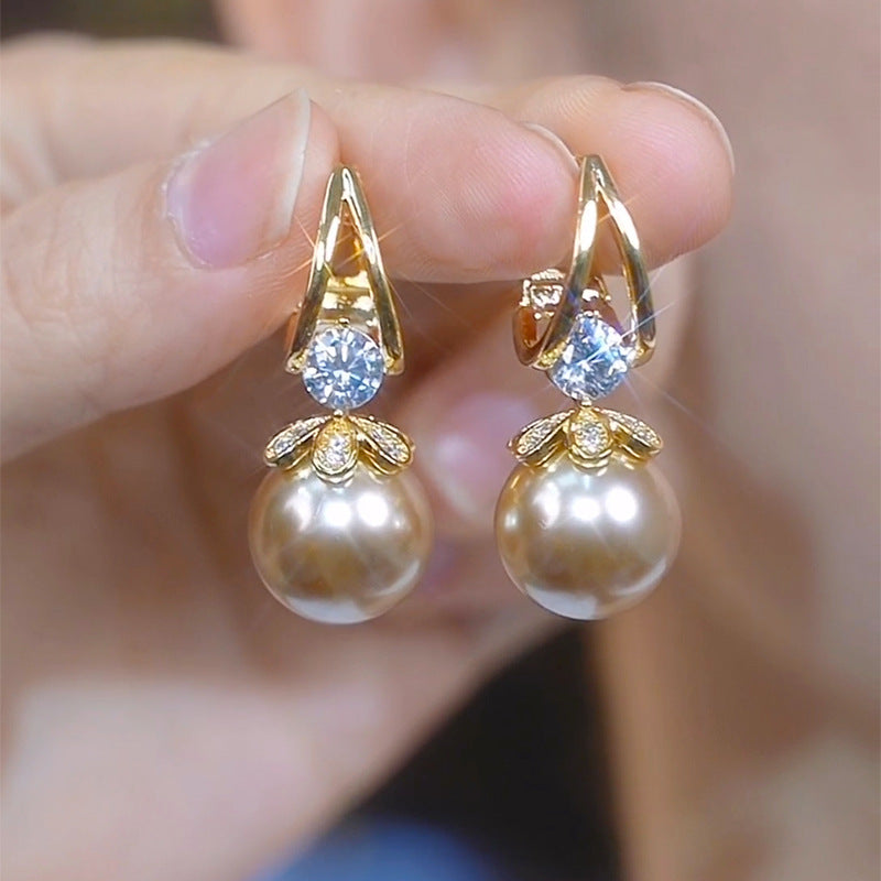 【Compre uno y llévese otro gratis】 Pendientes de plata con perlas de lujo francés de nuevo estilo 2025