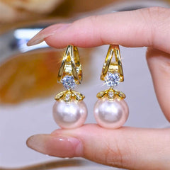 【Compre uno y llévese otro gratis】 Pendientes de plata con perlas de lujo francés de nuevo estilo 2025
